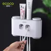 Diş fırçası tutucular ecoco tutucu otomatik sıkma diş macunu dağıtıcı duvar kupası depolama banyo aksesuarları 230308