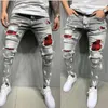 Jeans masculinos Men pintados de trechos magros magros rasgados rasgados com calças de jeans de jeans de jeans de jeans de calça casual para masculina