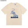 Projektant New America Tide Brand Rhude Printed T Shirts Projektant T Shirt Mężczyzn Kobiety za okrągłe szyję TEES TEE STREET RHUDE