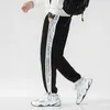 Męskie spodnie Patchwork Streetwear Mężczyźni Kobiety Ogółe Spodnie Spodnie sportowe sznurki dresowe Męskie dres Hip Hop Joggers 2022 Z0306