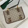 Hem erkekler hem de kadınlar için tasarımcı çantası Tiger Head crossbody çanta vintage deri omuz çantası erkek ve kadın moda trend el çantası