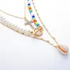 Kedjor Wild Ocean Wind Shell Halsband Kvinnlig Asymmetrisk handpärlad Cross Party Gift Fashion Charm smycken