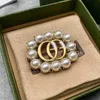 Factory wholesale 2023 New Luxury High Quality Fashion Jewelry for pearl with brass double light luxury brooch pin