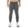 Herenbroek mannen runnen fitness potlood jogger jogger jogger jogger bodybuilding training fietsbroeken slanke lange broek wandelkleding voor man