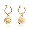 Orecchini a cerchio Huggie Hoop 1Pair European Trendy Gold Metal Eye per le donne Vintage piccolo ciondolo rotondo gioielli cerchio infinito E599