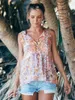 Damenblusen, Flordevida, ärmellose Bluse mit Blumenmuster, V-Ausschnitt, Quastenbindung, Boho-Stil, Bohemian-Stil, Sommeroberteile, Urlaub