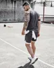 Fitnessstudio-Bekleidung Herren-Körpertraining 2-in-1-Shorts Workout Laufen 7" kurz mit Handtuchschlaufe D40t