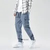 メンズジーンズスプリングアントム夏夏のメンパンツペンシルプラスサイズ6xl 7xl 8xlポケットカジュアルハイストリート韓国スタイルファッションスケートパントル48
