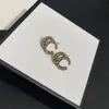 Retro g dubbele heren designer oorbellen voor vrouwen punk rock onderscheidende liefhebbers eenvoudige twisted ohrringe mode-sieraden luxe oorbellen nooit vervagen ZB034 E23