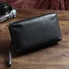 Portafogli AETOO Pochette in pelle da uomo Morbida pelle bovina vintage Borsa lunga Borsa per cellulare casual Semplice