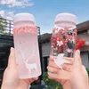 Vattenflaskor Creative Cherry Blossoms Frosted Glass Water Bottle Kawaii Reindeer Bottle For Girl Cute Pink Portable Sport Drink Flaskor 230309