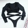 Swimons de maillots de bain Sexy Black Black à manches longues Bikini 2 pièces Push Up Femmes 2023 Été Deep V Suivi de natation Bandage Thong