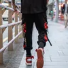 Męskie spodnie Hip Hop czarny ładunek joggery spodnie dresowe Wstrzeżne wstążki haremowe kobiety mody mody 230309