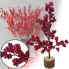 Decoratieve bloemen geven de voorkeur aan festival decor schuimbonen pography putten kunstmatige planten houten basis rode bessen takken kerstbessenboom