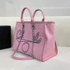 bolsa de ombro rosa bolsa de canal de praia com alça bolsa de lona alça de ombro de tamanho médio para compras em movimento cc bolsa de praia bolsa de grife de luxo feminina