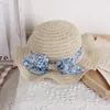 Chapéus 2023 Capéu de palha Pai child tap Pearl Beach Bowknot Steamer Topi Han Edition Small Pure Fresh Fresh Children's