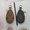 Keychain högkvalitativ nyckelfodral naturlig läder bil fjärrkontrollväska mode klassiska plånbokhängen tillbehör