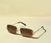 Tint Diamond Cut Rimless Lenses Solglasögon för män Klassiska guldrosa skuggade solglasögon nyanser gafas de sol designers solglasögon uv400 glasögon med låda