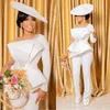 Illusion Long Sleeve Jumpsuit a-line Wedding Dresses with Peplum 2023 O-neck Pearls Beaded Bohemian Garden Bridal Gown Pant Suit