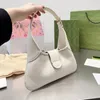 Sac à bandoulière pour femmes Designer Package Messenger Totes Mode Sacs à main métalliques Cadeau classique en gros Cuir souple Voyage Fête de vacances 2023