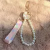 Designer Keychain Luxury Brand Key Chain Women Fashion Safety Keychains Pearl Ribbon Ring Bag Pendant Lanyards For Earphone Cases