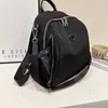Nylon-stöld av stor kapacitet för ryggsäck 2023 New Women's Bag designer ryggsäck lättvikt mode en-axel messenger handväska