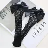 Chaussettes en résille noires respirantes avec nœud papillon, Harajuku, chaussettes Sexy en filet ajouré pour femmes et filles