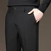 Мужские брюки весеннее лето мужские брюки Слим бизнес -офис Упругое талия черно -серая классические корейские брюки мужчина плюс 2738 40 42 230309