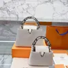 Capucines BB Çanta Katı Tahıl Taurillon Deri Mini Tote Çanta Macaron Koleksiyonu Lüks Bayanlar Yılan Baskı Moda Flap Crossbody Üst Sap