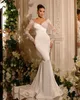 2023 Luxury Mermaid Wedding Dresses Sequins Appliques spets sexiga V-ringade långa ärmar brudklänningar skräddarsydda avtagbara tåg vestidos de novia