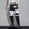 Męskie spodnie klasyczne streetwearne spodni Mężczyzn Rirus Harem Jogging Spods Mężczyzna Slim Fit Sposób Cargo Spodnie Multi-Pockets Women Spodni J7 230309