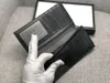 Heren Echt lederen vouw Wallet Cowhide Materiaal Materiaal Purse Goud Teken Designer Wallet Soft Leather Wallets Card Holder Coin Purse met originele doos