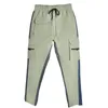 Męskie spodnie Outdoor Sports Night Run Refleksyjne spodnie Summer Europejskie i amerykańskie hip-hopowe małe spodni ładunkowe 230309