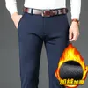 Pantaloni da uomo invernali di marca classici attillati dritti in pile elasticizzato spesso caldo business casual pantaloni slim a vita alta da uomo