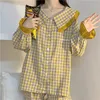 Женская женская одежда для сна сладкая клетчатая пижама наборы женщин с длинным рукавом из эластичные брюки для талии свободная комната домашней одежды милые осенние оборки пижамы 2pcs 230309