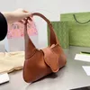 Sac à bandoulière pour femmes Designer Package Messenger Totes Mode Sacs à main métalliques Cadeau classique en gros Cuir souple Voyage Fête de vacances 2023