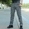 Spodnie męskie spodnie TAKTICAL CARGO MĘŻCZYZN WODOOR WODORPORMOWYCH W BADANIE WOJSKIEM PRZEPŁYWAMI Kamuflażowe Spodnie Casual Multi Pocket Pants Męskie Joggery 6xl 230310