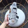 2023 De nieuwe rondhoofdige veterschoenen casual schoenen Sneakers Fashion Flowers lederen patchwork low-top runway platform merknaam heren en dames casual schoenen