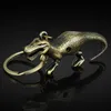 Key Rings Fashion Metal Key Ring Car-styling Vintage Bag Purse Pendant Dinosaur Keyring Car Key Chain Auto Keychain S382