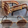 Diseñador de lujo Nuevas gafas de sol para hombres y mujeres 20% de descuento en madera Redonda Hombres Metal Retro Gafas de madera clásicas Tonos de conducción para mujeres Negro Rojo Blanco Gafas de fiestaKajia