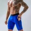 Gymkläder Mens som kör shorts med fickor Sport Man Fitness Training Compression Basketball Tights