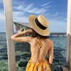 Chapeaux à bord large du paille en bord de mer Feme femme d'été célébrité Sunshade Suncreen Plat Rim Small Fresh Korean Tide Tide