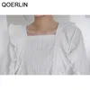 Damenblusen QOERLIN Design Spitze aushöhlen weiße Hemden Girly Chic Flare Sleeve Herbst Tops Bluse Unregelmäßige Rüschen Frauen