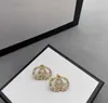 Moda mujer diseñador pendientes Chram doble letra Studs 18K chapado en oro en forma de corazón pendientes de perlas para dama fiesta boda aro joyería con caja de regalo en relieve