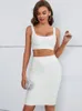 Arbetsklänningar kvinnor sommar sexig ärmlös rygglös tankrosa vita mini bodycon kjol bandage set 2023 elegant kvällsklubb party kläder