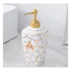 Ensemble d'accessoires de bain Salle de bains Céramique Cinq pièces Toilettes nordiques Unique Or Mosaïque Texture Gargarisme Tasse Lotion Bouteille Porte-brosse à dents Porte-savon