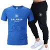 رجال المسارات ، رجال القطن بيع العلامة التجارية الصيفية tshirtpants بدلة الترفيه اللياقة البدنية الركض السراويل أزياء Hiphop Tshirt 230310