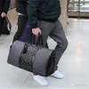 Duffel رجالي مصمم حقيبة سفر مخلب على حقيبة أمتعة الرجال كرة السلة حقائب Keepall 55CM واضح حقيبة يد النساء واق من المطر Louiseity 41412A Viutonity