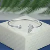 Bracelets porte-bonheur luxe femme blanc Zircon Bracelet mignon couleur argent réglable pour les femmes cristal papillon aile chaîne