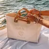 2023 Tasarımcılar Çantalar Üst Tapı Deauville Tote Cüzdan Luxurys Tote debriyaj Çapraz Vücut Beach Shopper Tatil Artsy Toates İnci Tuval Omuz Çantası